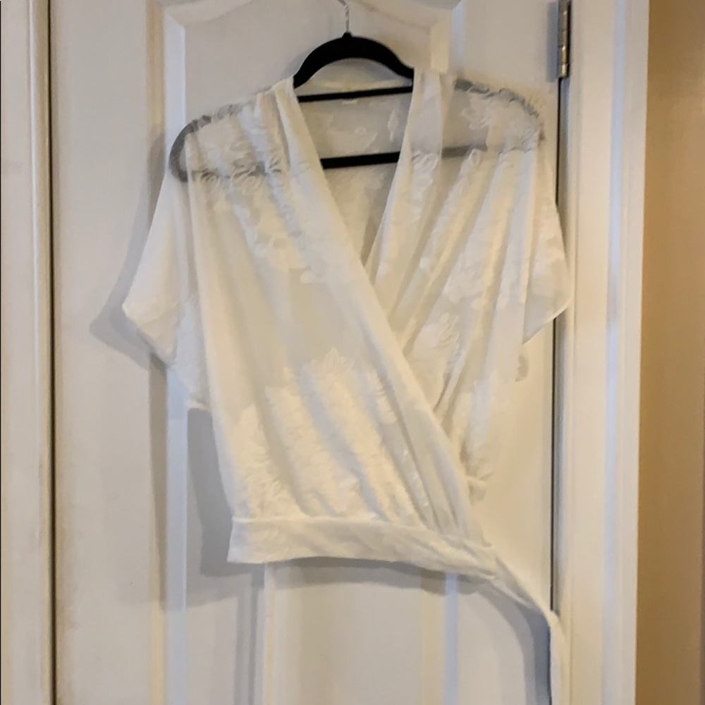 Floral patterned white wrap top
